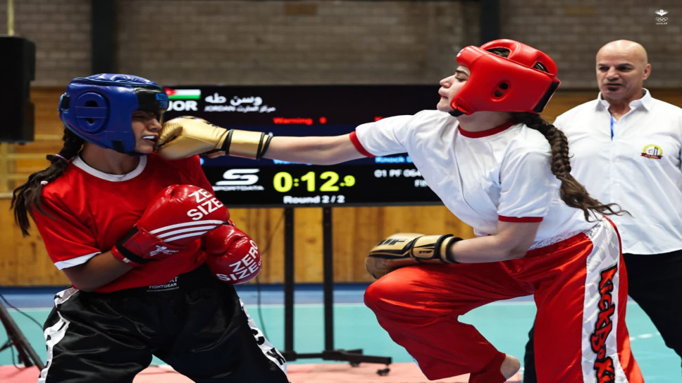 صورة حول : الكيك بوكسينغ النسائي في الأردن يحقق نجاحًا كبيرًا بمشاركة 90 لاعبة الكيك بوكسينغ النسائي في الأردن يحقق نجاحًا كبيرًا بمشاركة 90 لاعبة