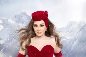 إليسا تتألق بالأحمر في جلسة تصوير شتوية وتحتفل بالكريسماس