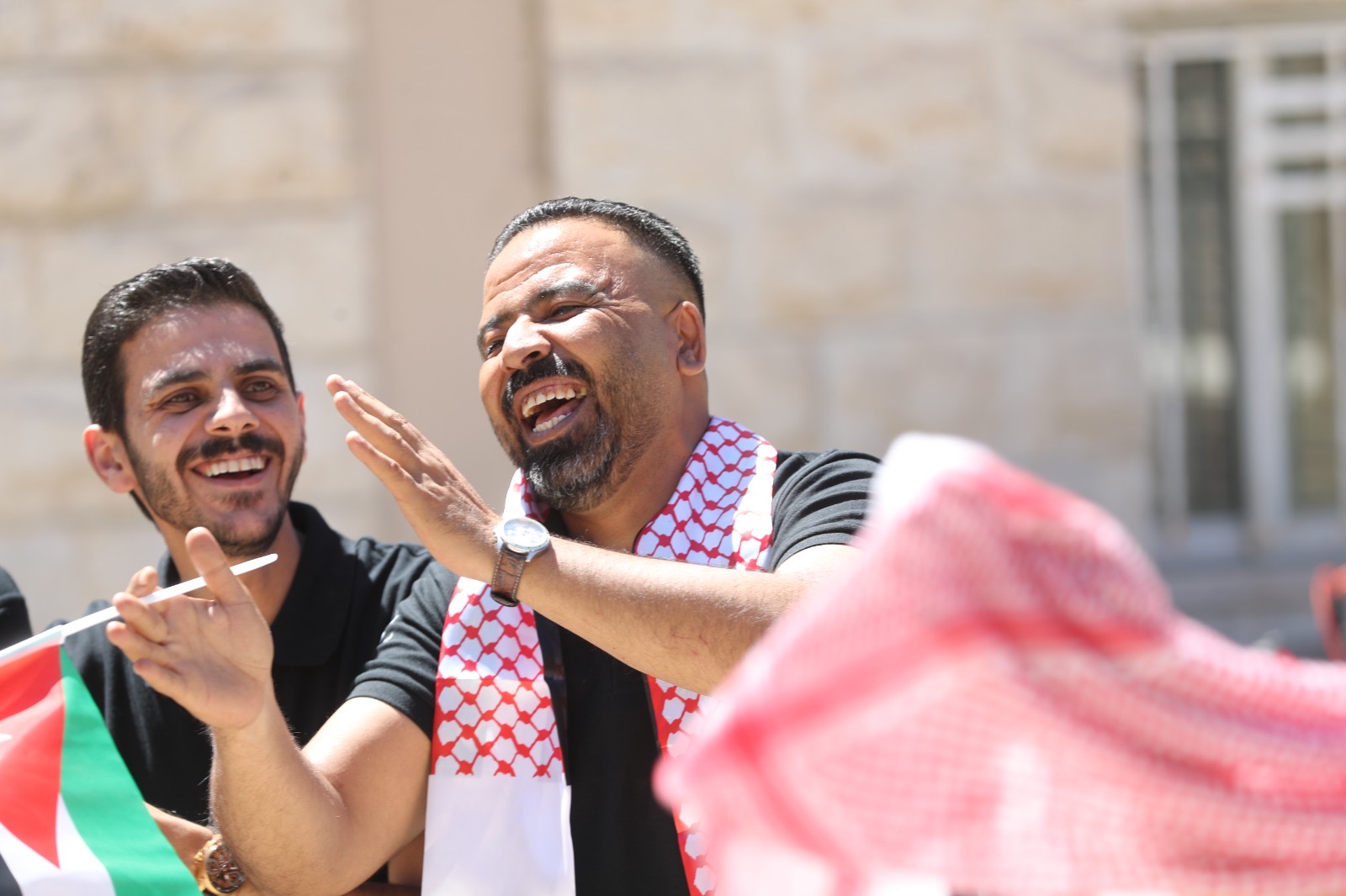 موظفو الأسواق الحرة الأردنية يحتفلون بعيد الاستقلال الـ80