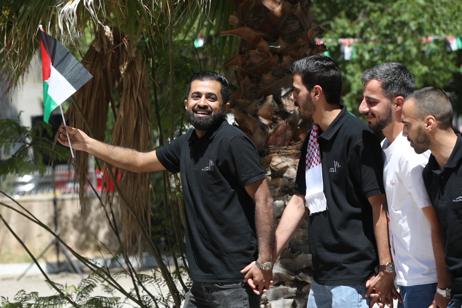 موظفو الأسواق الحرة الأردنية يحتفلون بعيد الاستقلال الـ80