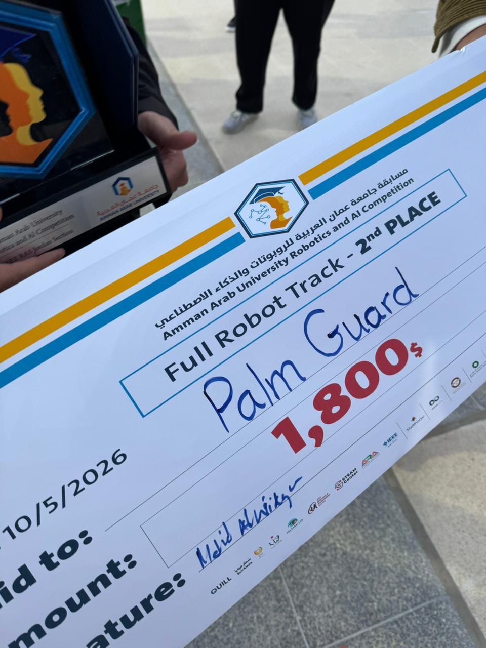 جامعة البترا تحصد المركز الثاني عربيًا في الروبوتات والذكاء الاصطناعي عبر فريق Vcoders بمشروع "Palm Guard"
