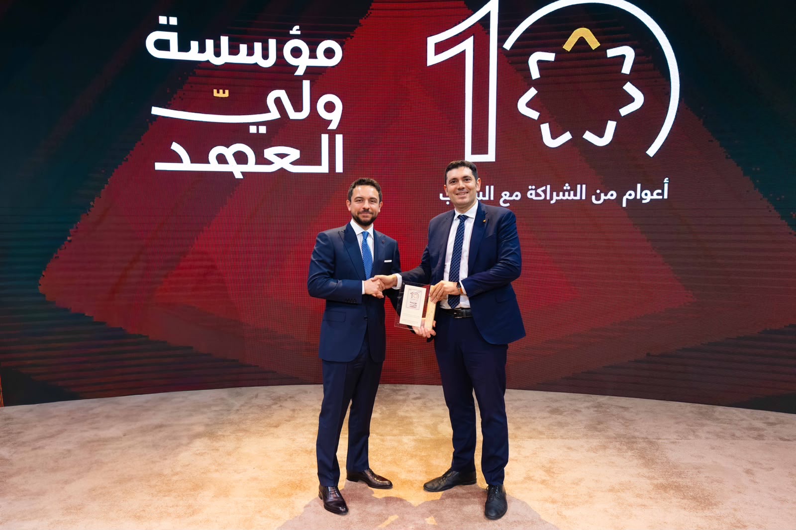صورة حول : ولي العهد يكرم أورنج الأردن خلال احتفال مؤسسة ولي العهد بالذكرى العاشرة لتأسيسها ولي العهد يكرم أورنج الأردن خلال احتفال مؤسسة ولي العهد بالذكرى العاشرة لتأسيسها