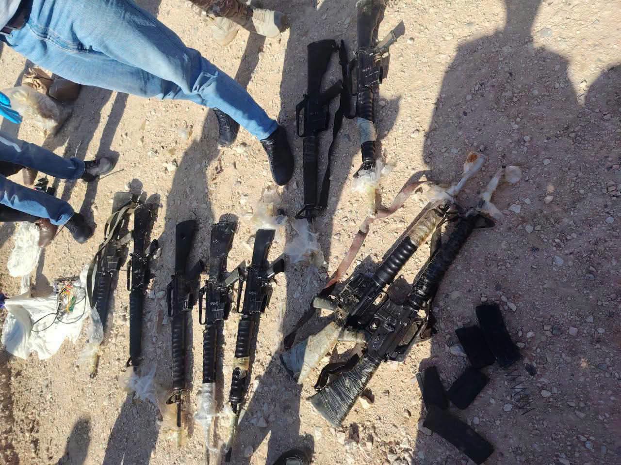 الأمن العام يضبط 9 أسلحة أوتوماتيكية هربت إلى الكرك بواسطة بالونات حرارية